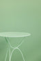 Table Ø 60 cm AIRLOOP en acier pour EXTÉRIEUR de la marque française FERMOB®. Acheter Fermob en ligne. Rincón del Mueble